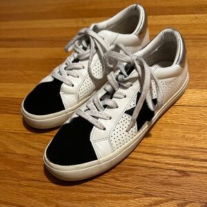 Vintage Havana black and gold sneakers